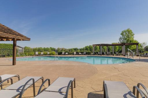 The resort life comes to you with this pristine community pool!