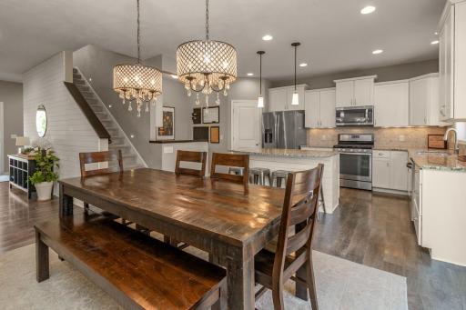 Open concept connects the living, dining and kitchen areas.
