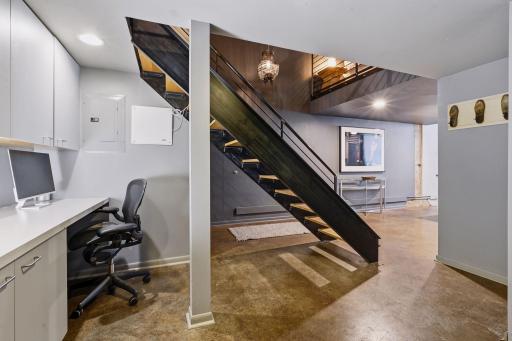 Architectural Staircase Connecting Both Levels, 2nd office area, storage and in-unit laundry