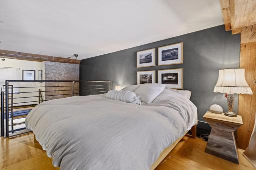Spacious Bedroom with Loft Character & Warm Wood Beams