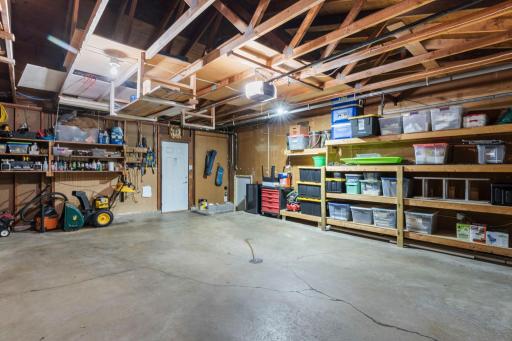 Attached 2 Car Garage with Plenty of Storage and a Mini Frig