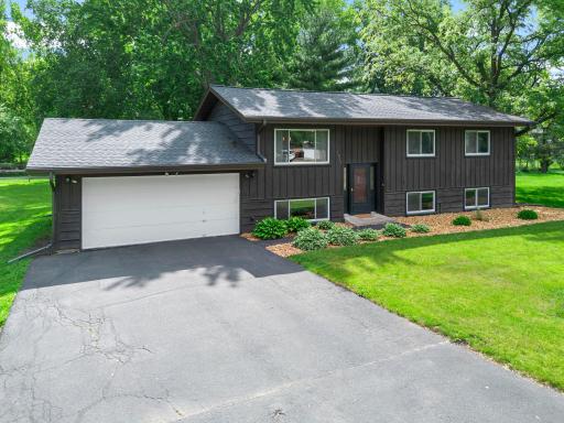 Asphalt Driveway, 2 Car Attached Garage, Newer Roof, and Fresh Coat of Mulch