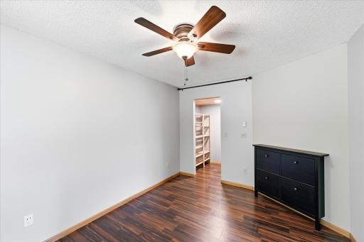A spacious bedroom complete with a walk-in closet. A versatile space for guests, hobbies, or a home office.