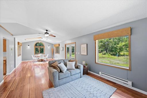 Vaulted ceilings and walls of windows create an airy feel.