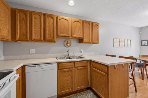 Its open layout flows seamlessly into the dining area, making everyday living and entertaining a breeze.