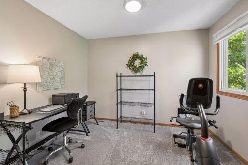One room is currently configured as a home office, showcasing the home's versatile floor plan.