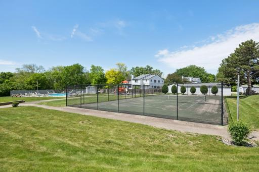 Enjoy resort-style amenities just steps from your door, including a sparkling outdoor pool, tennis court, and playground.