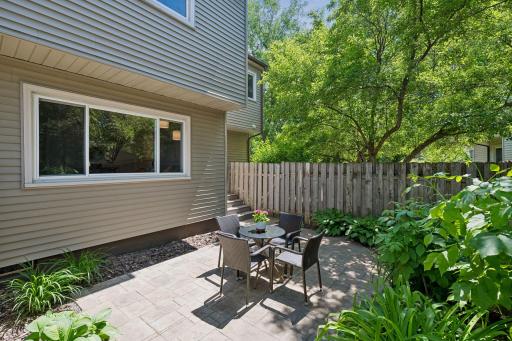 This peaceful outdoor oasis offers the perfect setting for morning coffee, outdoor dining, or relaxing summer evenings with exceptional privacy and natural beauty.