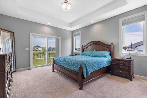Primary bedroom with walk out to patio!