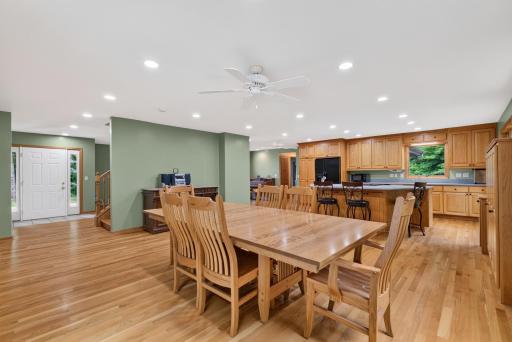 Spacious Kitchen and dining features gleaming hardwood floors.