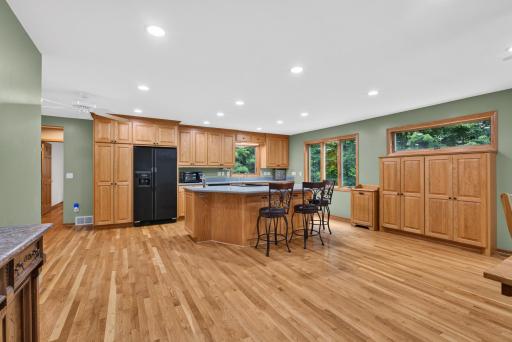 Large center island with prep sink and cooktop