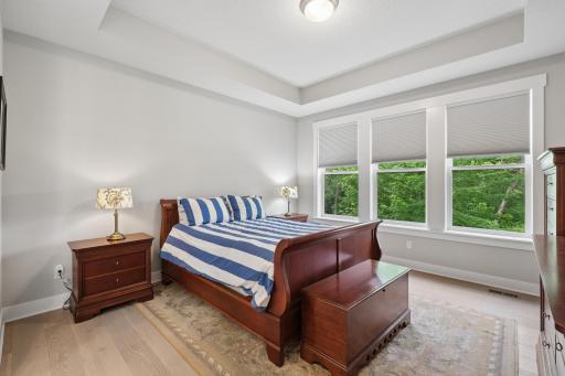 The primary bedroom is a refined sanctuary where relaxation takes center stage. Natural light enhances the rooms open airy fee. Inviting slow mornings and restful nights.
