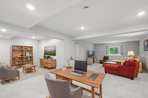 With its flexible layout and spacious design, this virtually staged room presents an ideal opportunity to create a customized living space tailored to your lifestyle, making it a standout feature within the home.