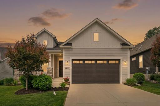 A warm and inviting first impression at twilight, this beautiful villa glows with soft interior lighting that highlights its elegant architecture and charming curb appeal. Thank you for previewing the home. Contact your realtor for a private showing