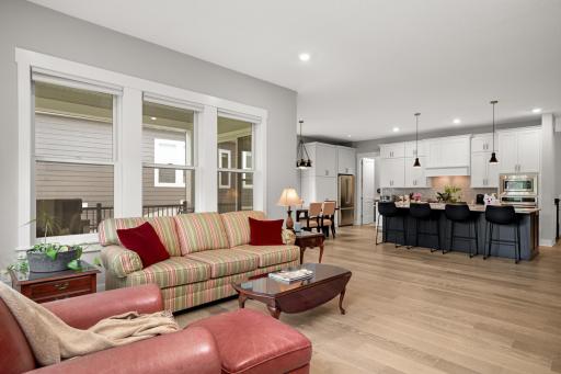 Fourth view of the living room, showcasing the seating area, furniture arrangement, and overall spatial layout.