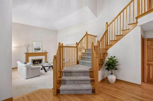 Welcoming grand entry with soaring ceilings and an open floor plan that creates an airy, spacious feel.