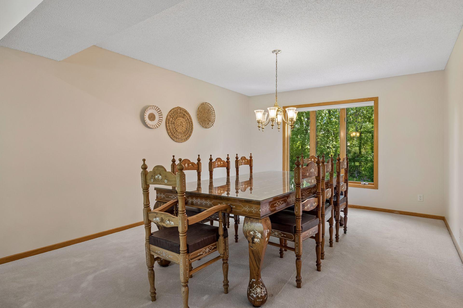 Generously sized dining room conveniently located off the kitchen, offering plenty of space for large gatherings and entertaining.