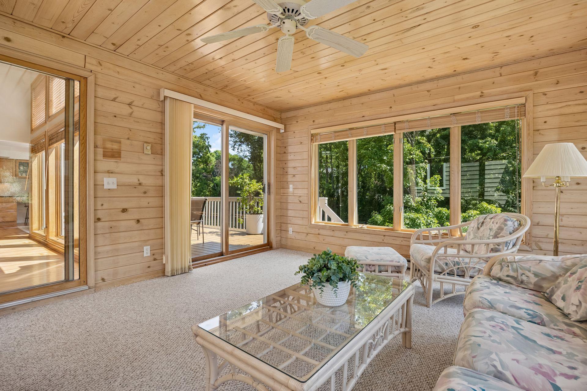 Private three-season porch with peaceful backyard views, offering a bright and inviting space to relax and enjoy the sunshine. Baseboard heating extends the season, making this a comfortable retreat well beyond the warmer months.