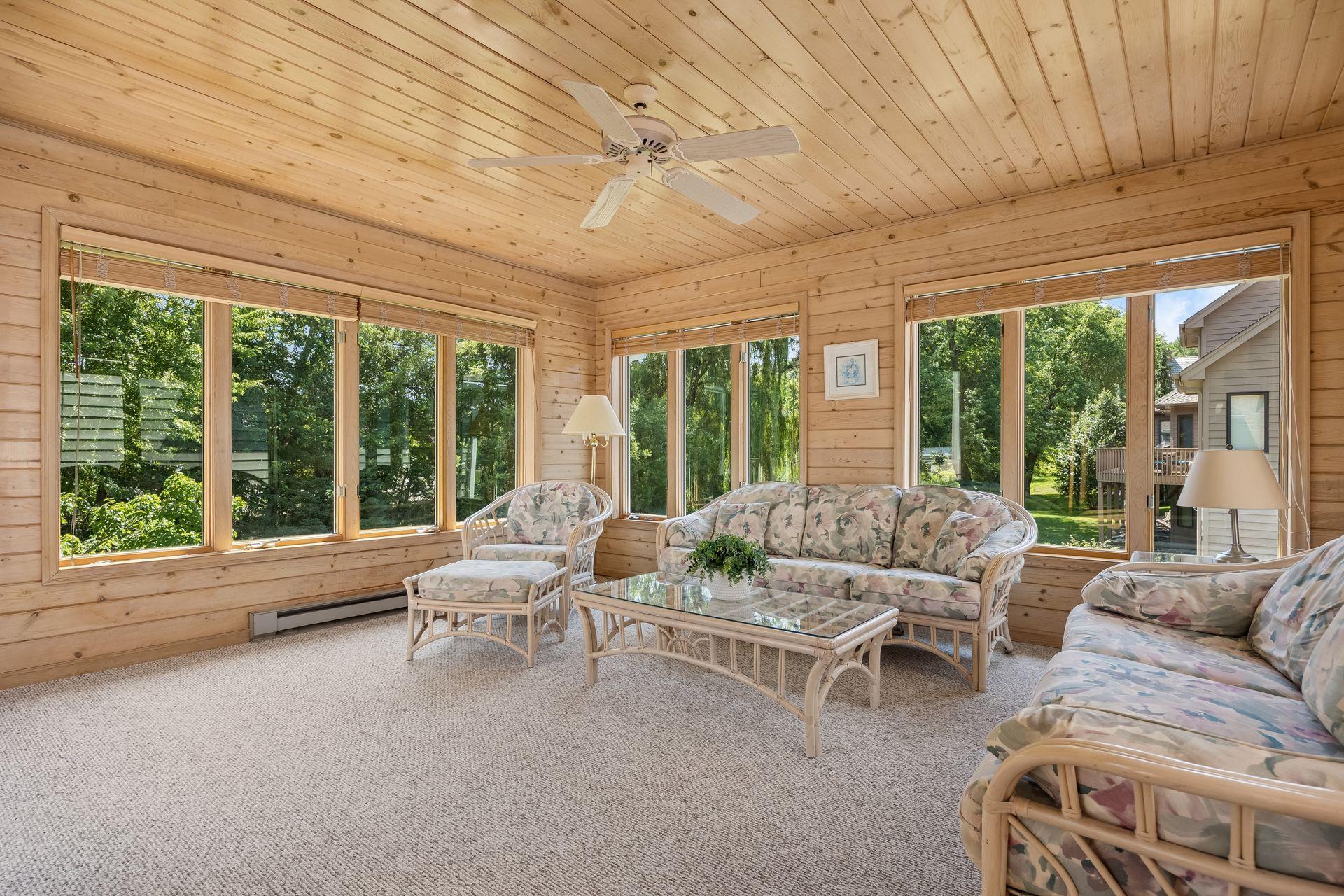 Private three-season porch with peaceful backyard views, offering a bright and inviting space to relax and enjoy the sunshine. Baseboard heating extends the season, making this a comfortable retreat well beyond the warmer months.