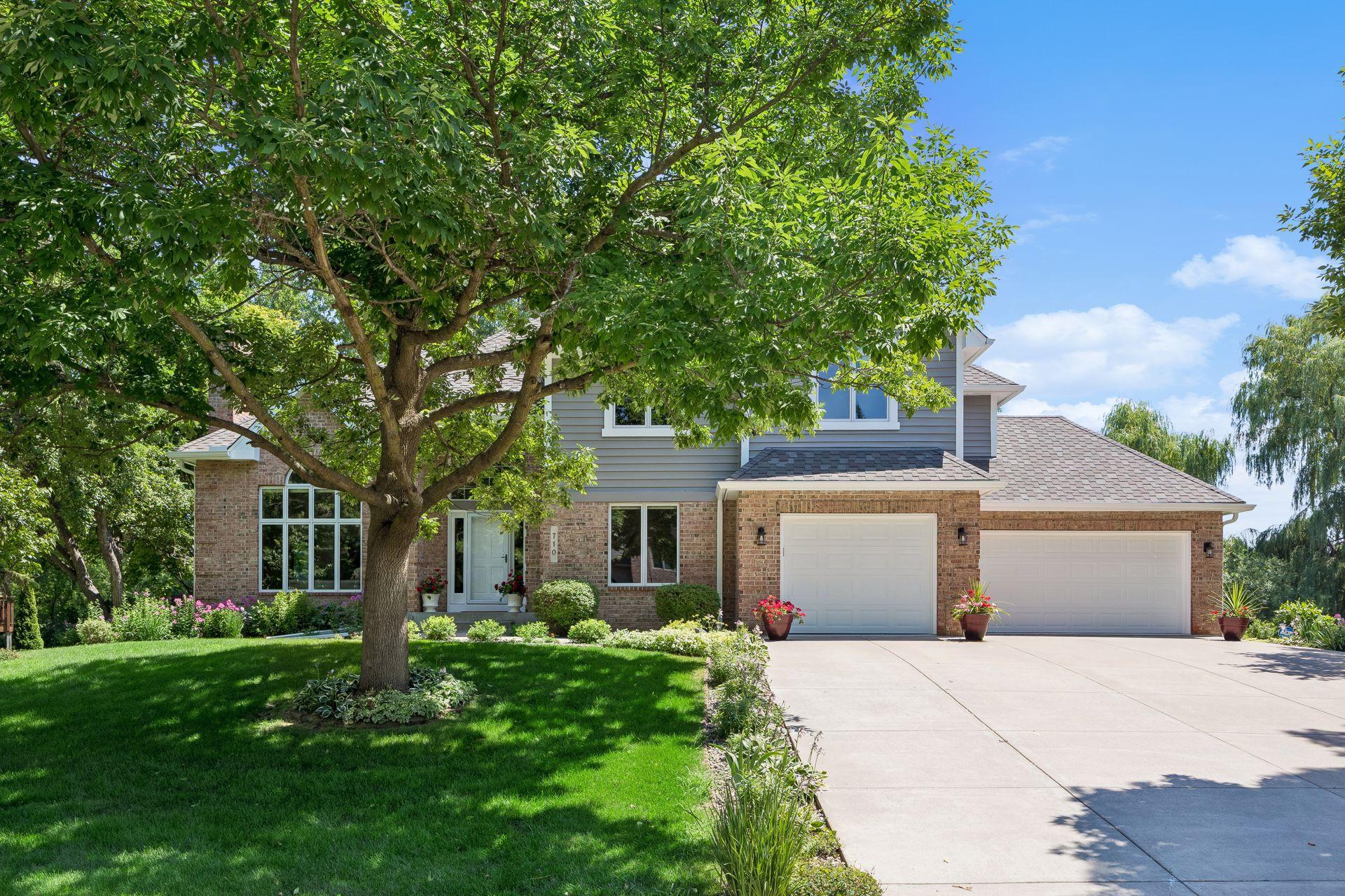 Inviting front exterior with attractive curb appeal and a freshly painted exterior, creating a welcoming first impression.