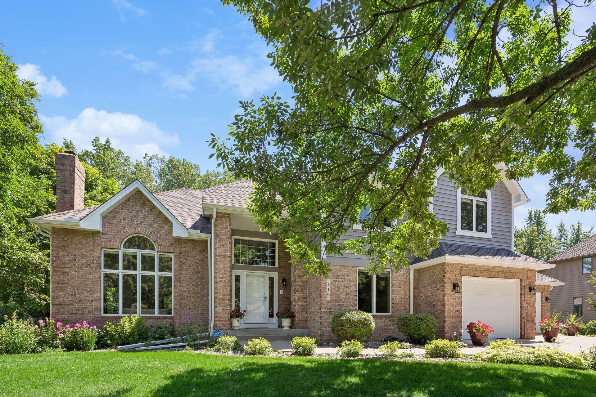 Inviting front exterior with attractive curb appeal and a freshly painted exterior, creating a welcoming first impression.