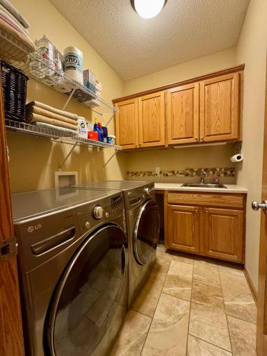 Main floor laundry and mudroom conveniently located off the garage.