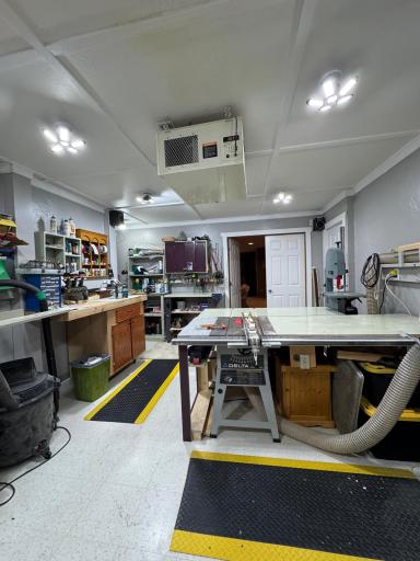 Bonus! The workshop offers a special place for hobbies or projects, and could easily be converted into a great work out space or play room..
