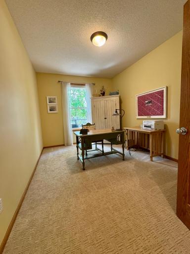 Flexible den perfect for a home office or flex room.