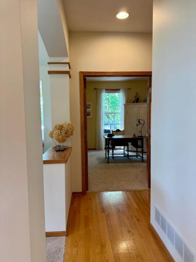 Gleaming hardwood floors lead you to the main floor office or flex room.