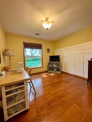 The 3rd bedroom, currently used as a hobby room, provides another warm and welcoming space.