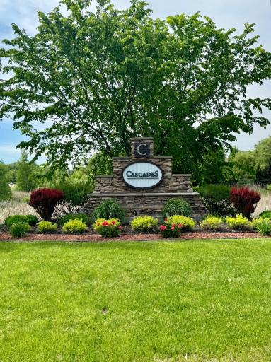 The Cascades welcomes you with a cheerful neighborhood entrance.