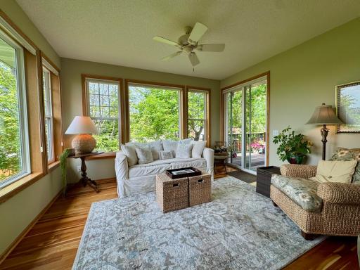 Photo for 4711 Walnut Grove Lane N, Minneapolis, MN 55446 - listing #7085138 Welcome to 4711 Walnut Grove Lane! Follow along from the spacious living room, filled with abundant natural light, into the best seat in the house...the sun room! Walls of windows line the four season sun porch for year-round enjoyment.