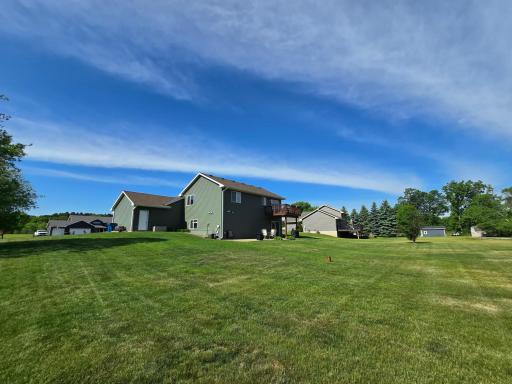 Plenty of room to run and play in this spacious, level backyard.