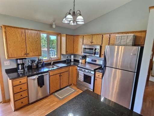 Plenty of cabinets, including those inside the island help keep dishes organized.