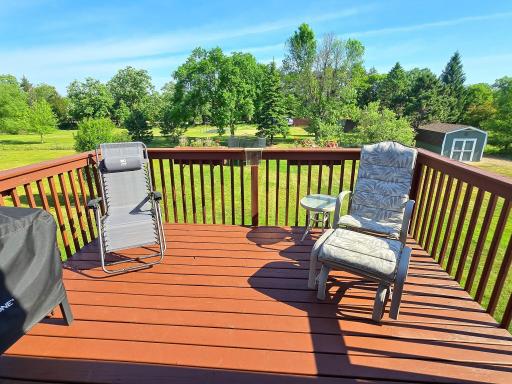 The 12' x 10' deck provides just the right amount of space and includes tranquil views of the backyard and many trees that surround.