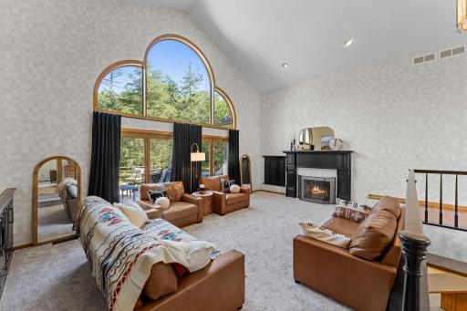 Cozy up to the wood burning fireplace that has a gas pilot for easy conversion.