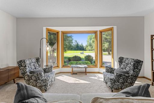 A gorgeous picture window with views of the south facing front of home