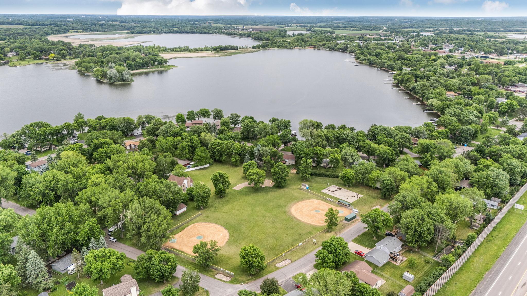 Enjoy easy access to nearby community amenities including parks and sports courts.