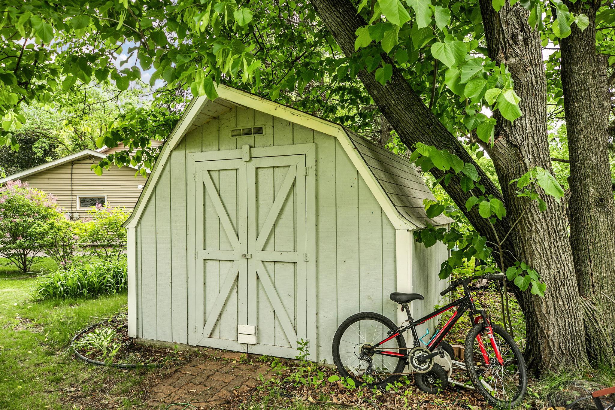 Property features a utility shed.