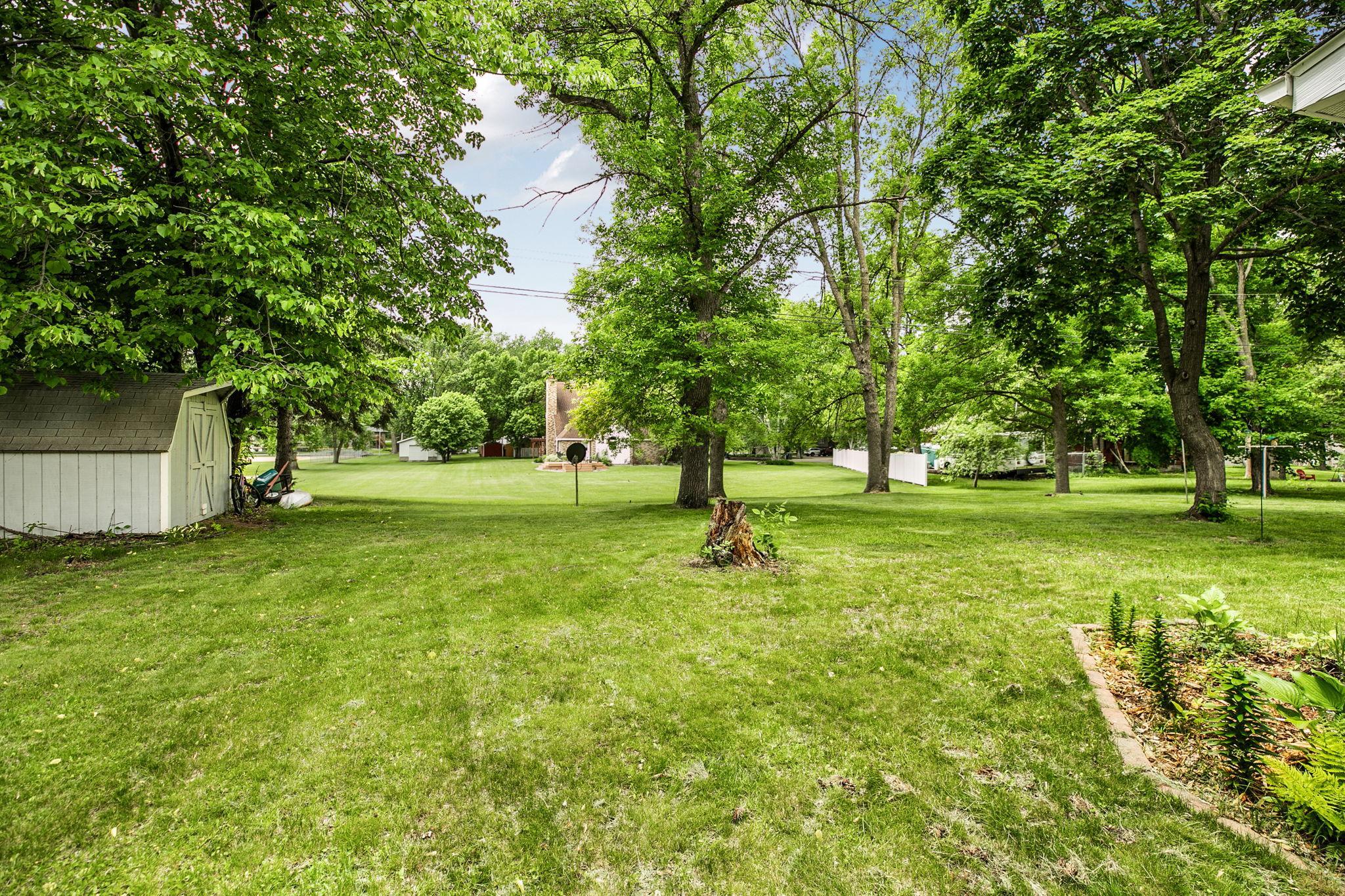 Tree-lined yard provides a peaceful and private retreat.