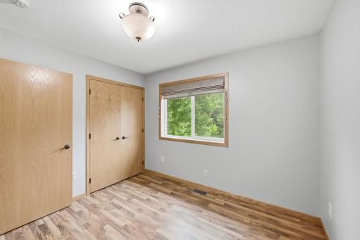 Bedroom with ample closet space