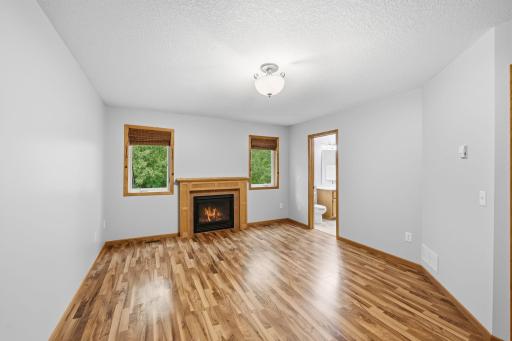 Cozy fireplace in the primary suite