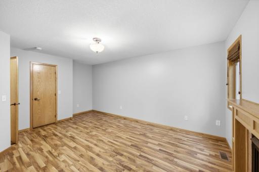 Spacious bedroom with laminate flooring