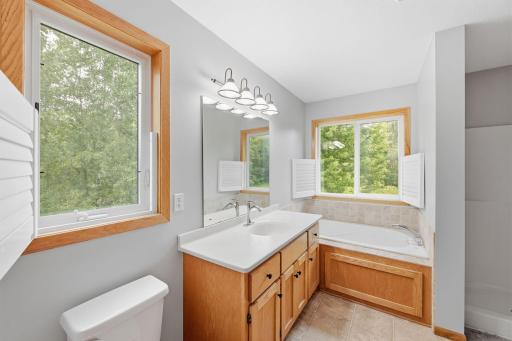 Soaking tub, natural light, and updated sink facet