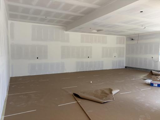 Large 4 car garage heated with floor drains