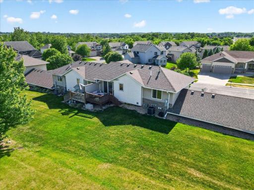 From above, the home's unique position becomes clearâbacking to expansive open space rather than neighboring rooftops.