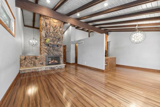 Step inside to vaulted ceilings and an open, airy living space filled with natural light.