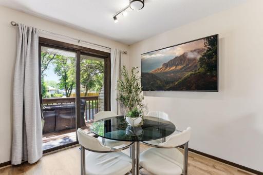 View from the dining area to the deck through the patio door.