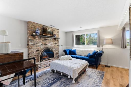 Enjoy the wood brick F/P in the family room.