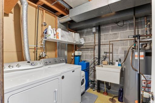 Utility room. Seller leaving both the washer and dryer.